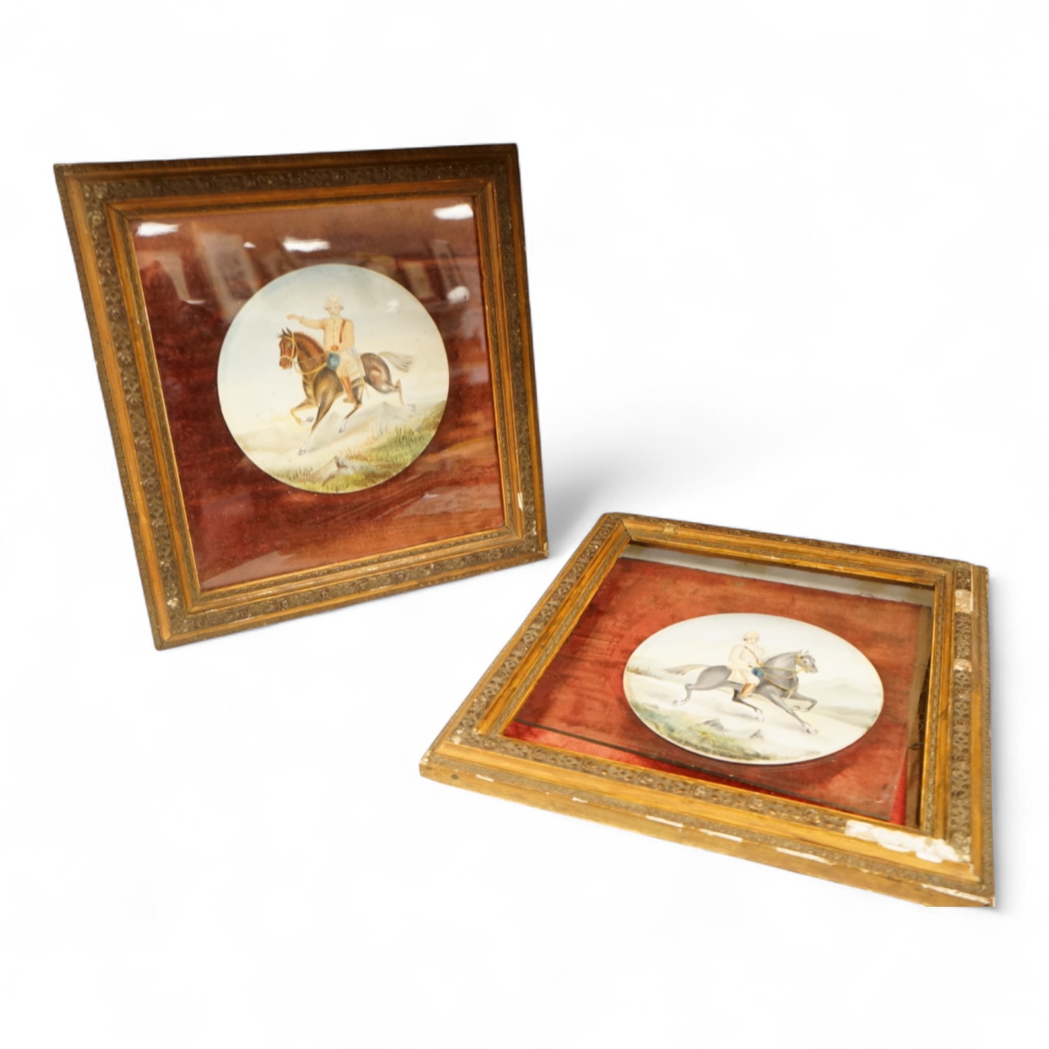 A pair of naive watercolours on circular porcelain panels, soldiers on horseback, framed, 15cm in diameter